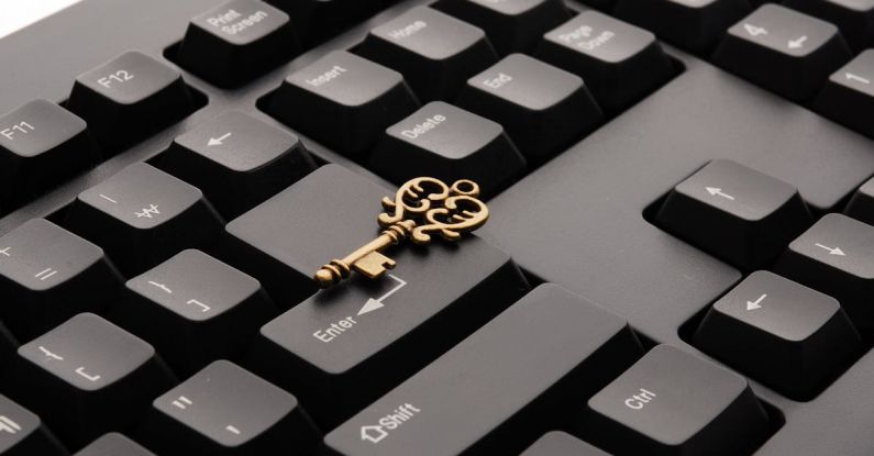 Key - Brass Ornate Vintage Key on Black Computer Keyboard