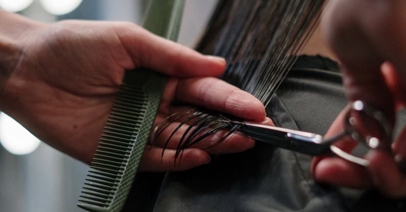 Key Cutting - Person Holding Black Hair Comb