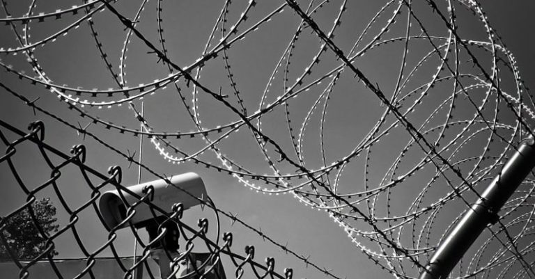 Access Control - Grayscale Photo of Barbed Wire