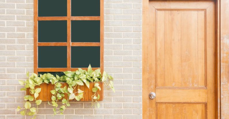 Door - Photo of Wooden Door Near Window