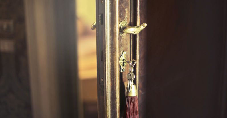 Entry Security - Key with trinket in shabby door