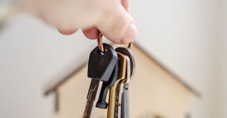 Key Breaks - Person with keys for real estate